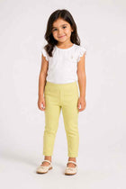 Light yellow pull-on pants for baby girls on model, ankle-length straight legs.