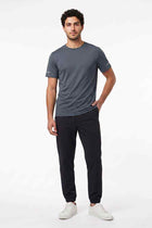 Men’s blue crew-neck active T-shirt with short sleeves and small logo tab on chest
