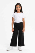 Girls' black wide-leg trousers with elastic waist and relaxed straight fit