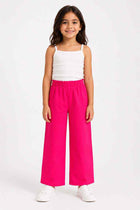 Girls' pink wide-leg trousers with elastic waist, ankle-length hem