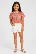 Girls printed T-shirt in tangerine with all-over speckled print, short sleeves
