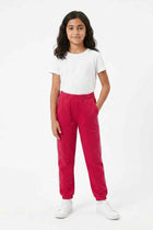 Girls' red jogger trousers with white piping, elastic waistband, cuffed hems