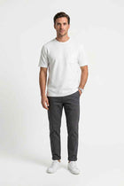 Men's white pocket T-shirt with crew neck, short sleeves, worn on model