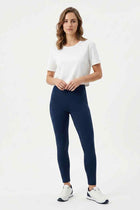 White cropped women’s basic T-shirt with crew neck and short sleeves on model