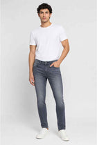 Men's slim-fit grey jeans front view, straight legs with cuffed hem