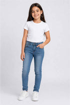 Girls' skinny fit light blue denim jeans with five-pocket design and belt loops