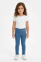 Light blue denim jeggings with front pockets and stitched fly detail