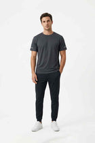 Men's dark gray mesh crewneck T-shirt on model, front view