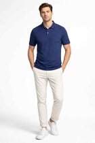 Men's navy classic polo shirt with short sleeves and buttoned collar