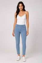 Light blue women's jeggings on model, slim fit with elastic waistband