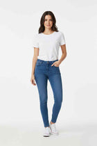 Women's skinny fit mid-blue jeans with zipper, belt loops, and front pockets