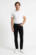 Men's black skinny fit jeans with belt loops, zipper fly, and front pockets