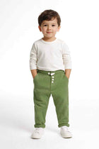 Green waffle-knit baby boy trousers with button front and cuffed ankles