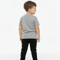 Black baby jogger trousers viewed from back, elastic waistband and tapered legs