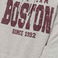 Men's heather grey hoodie close-up of maroon City Team large logo with 'Since 1992'