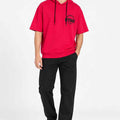 Men's cherry red short-sleeve hoodie with drawstring hood and front logo