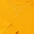 Men's orangey-yellow sweatshirt close-up: ribbed crewneck collar and cuff detail.
