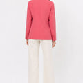 Womenâ€™s pink tailored blazer back view with long sleeves and center back seam