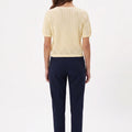 WomenÃ¢â‚¬â„¢s ecru pointelle knit short-sleeve cardigan, back view