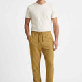 Men's khaki jogger trousers with drawstring waist and tapered legs, side pockets