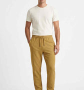 Men's khaki jogger trousers with drawstring waist and tapered legs, side pockets