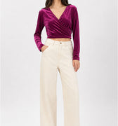 Prune velvet wrap blouse with long sleeves, V-neck, and cross-over front