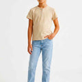 Beige ribbed girls top with short sleeves and buttoned henley neckline