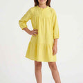 Yellow girls' dress, gathered front yoke with long puff sleeves and tiered skirt