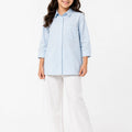 Light blue girls button-up solid shirt with pointed collar, long sleeves