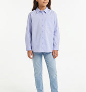 Girls light blue button-up shirt with long sleeves and collar