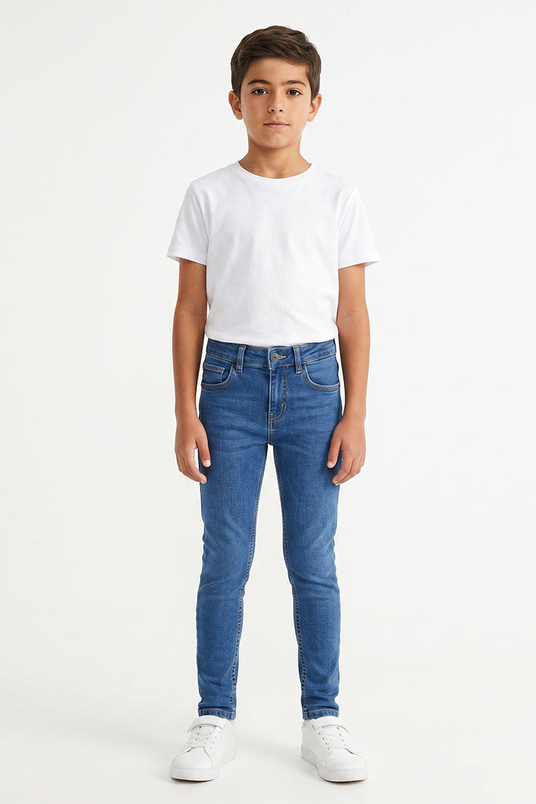Boys slim-fit dark blue denim jeans, straight legs and five-pocket styling
