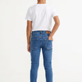 Boys slim-fit dark blue denim jeans, back view with five-pocket design