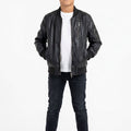 Black faux leather bomber jacket for boys with front zip and ribbed cuffs