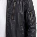 Black faux leather bomber jacket detail, zip pocket and front zipper