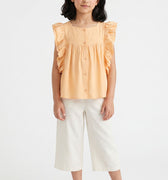 Girls deep peach sleeveless ruffle blouse with gathered yoke, front view