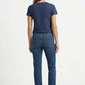 Women’s navy crew neck T-shirt from the back, short sleeves, straight hem.