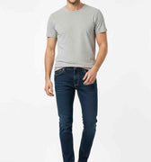 Men's slim-fit dark blue jeans with front pockets, belt loops, zip fly