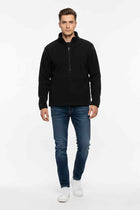 Men's black half-zip pullover, front view on model