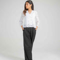 Women's embroidered basic shirt with 3/4 sleeves, paired with black wide-leg pants