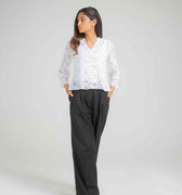 Women's embroidered basic shirt with 3/4 sleeves, paired with black wide-leg pants