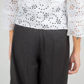 Women's embroidered basic shirt with 3/4 sleeves, worn with black pants