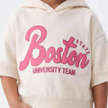 Girls' cream hooded sweatshirt with large pink 'Boston' typography on chest.