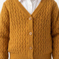 Gold yellow pointelle cardigan close-up with button front and V neckline