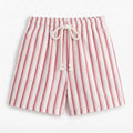 Pink-and-white striped drawstring shorts with tied waist