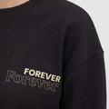 Black sweatshirt with 'Forever' script logo on sleeve/shoulder