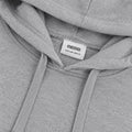 Grey hoodie close-up: hood lining, drawstrings, and inner neck label "meme"