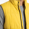 Yellow quilted puffer vest close-up with zippered front and stand collar