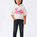 Girls' short-sleeve cream hoodie with pink Boston logo and ribbed hem, hood up.