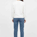 White women's graphic sweatshirt, back view with plain crewneck and long sleeves.