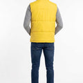 Men's yellow puffer vest, back view, quilted insulation